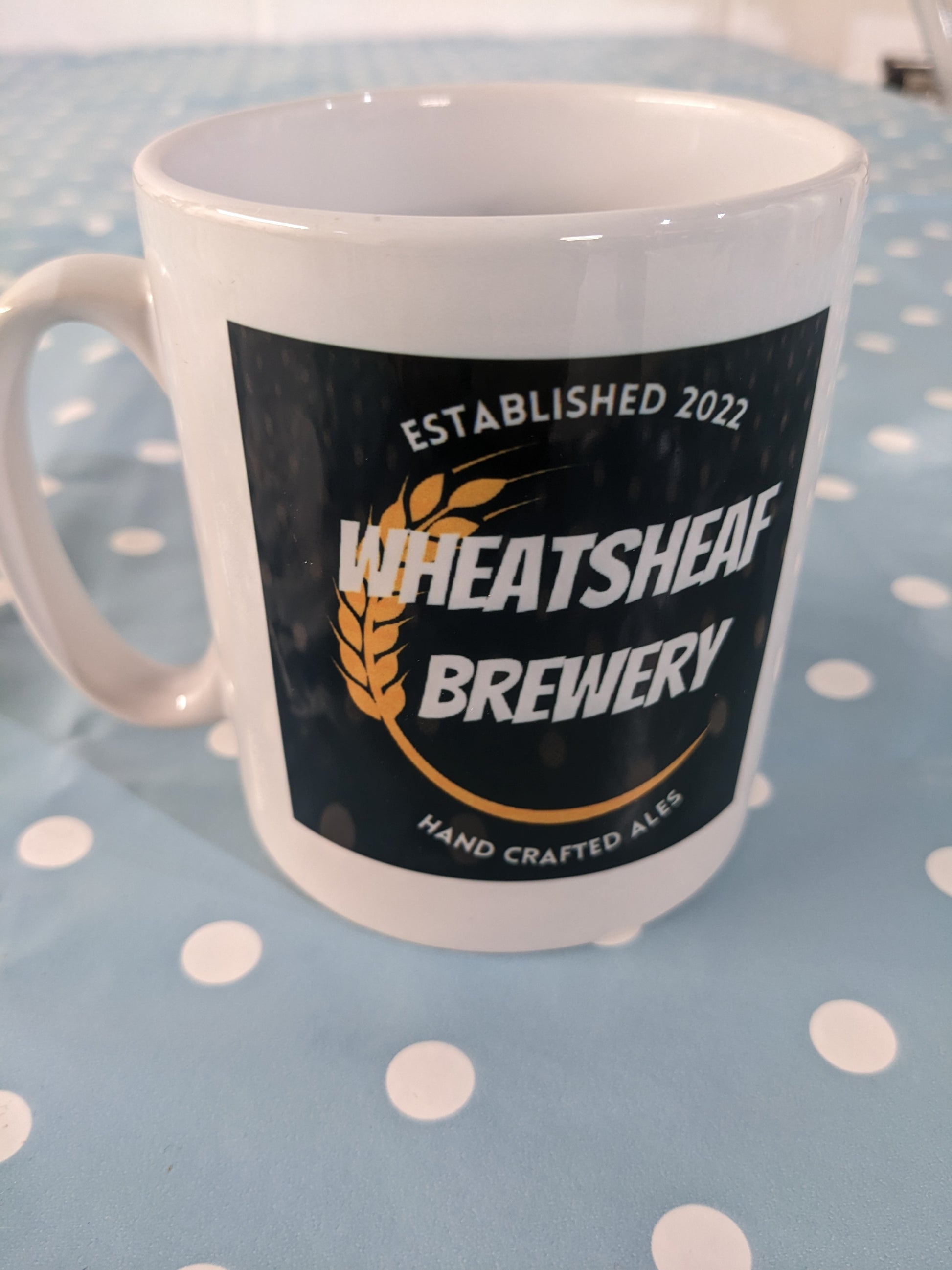 Photo of Wheatsheaf Brewery mug showing Wheatsheaf Brewery logo on a white coffee or tea mug